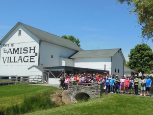 Group in front of an Amish barn Group in front of an Amish barn