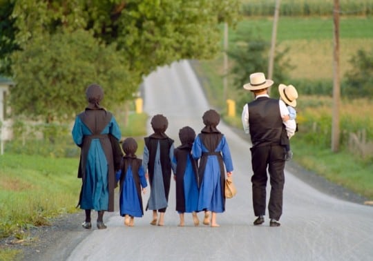 Amish family walking