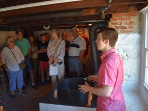 Tour group in the Summer Kitchen at Amish Village Tour group in the Summer Kitchen at Amish Village