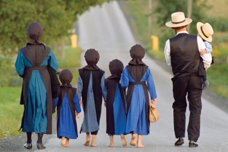 Amish Family An Amish family walking on a country road