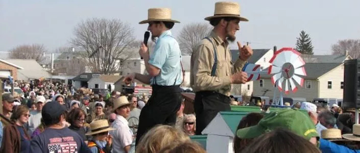 Two Amish Auctioneers hosting at a local mudsale in Lancaster county